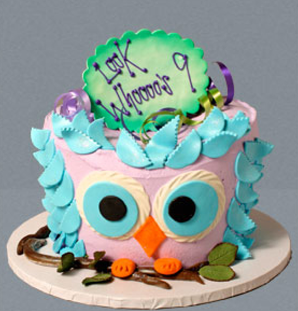 A cake that is shaped like an owl.